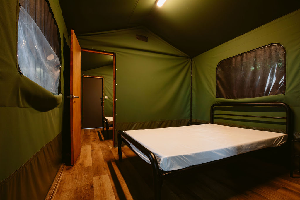 Image shows the interior of our suite style Safari Tents