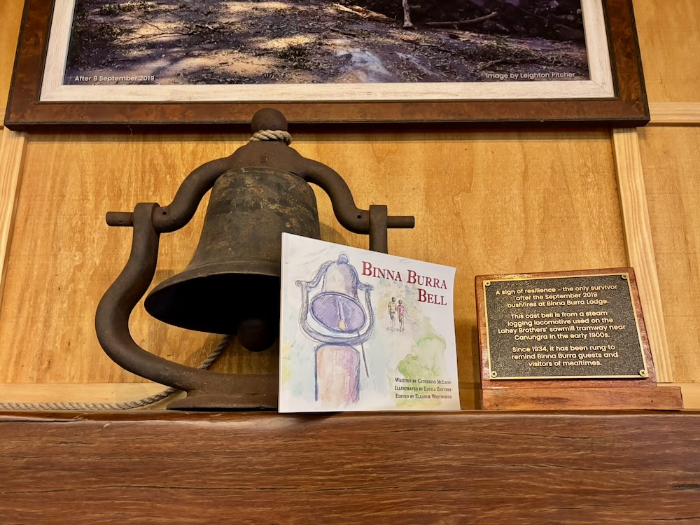 Image shows the Shay Bell at Binna Burra and the Children's Book it inspired.