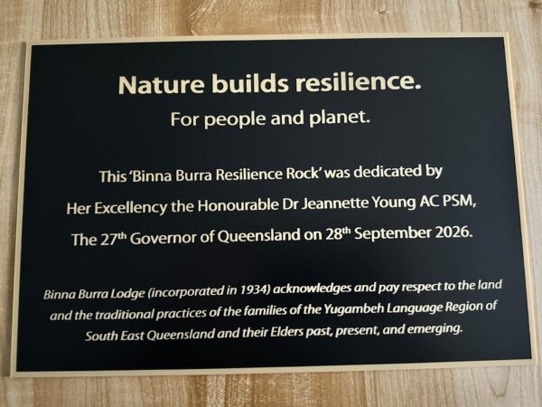 Image shows the plaque on Resilience Rock dedicated by the Governor of Queensland
